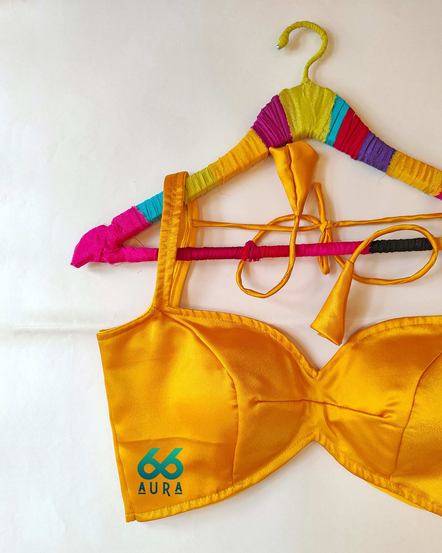 AMBER AURA SLEEVELESS BLOUSE