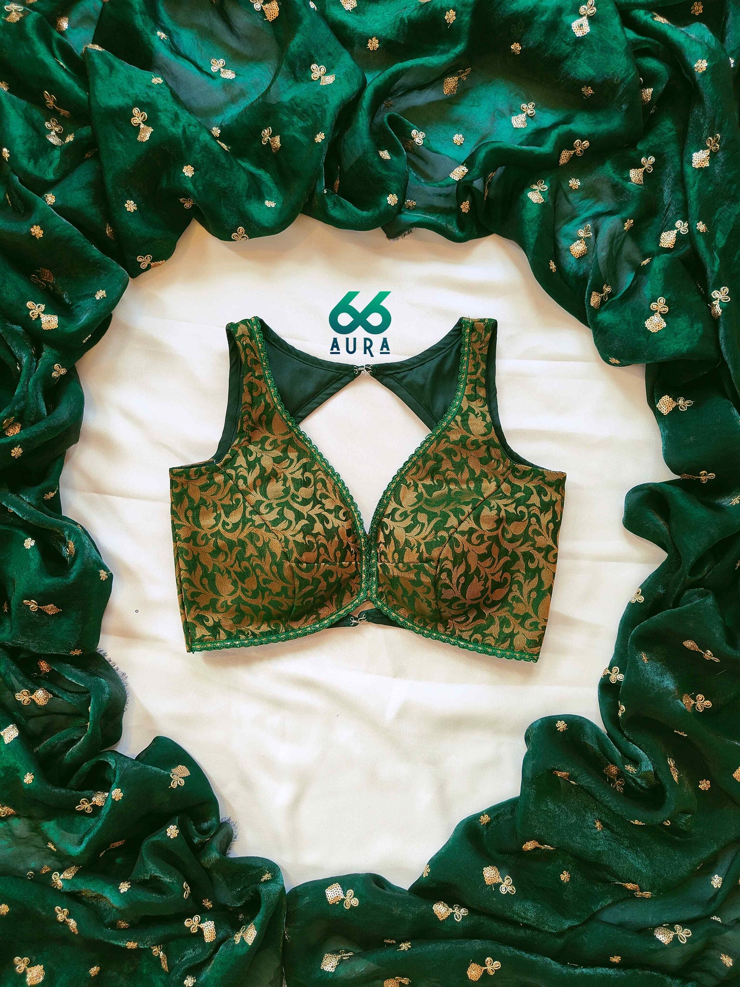 EMERALD AURA SLEEVELESS BLOUSE