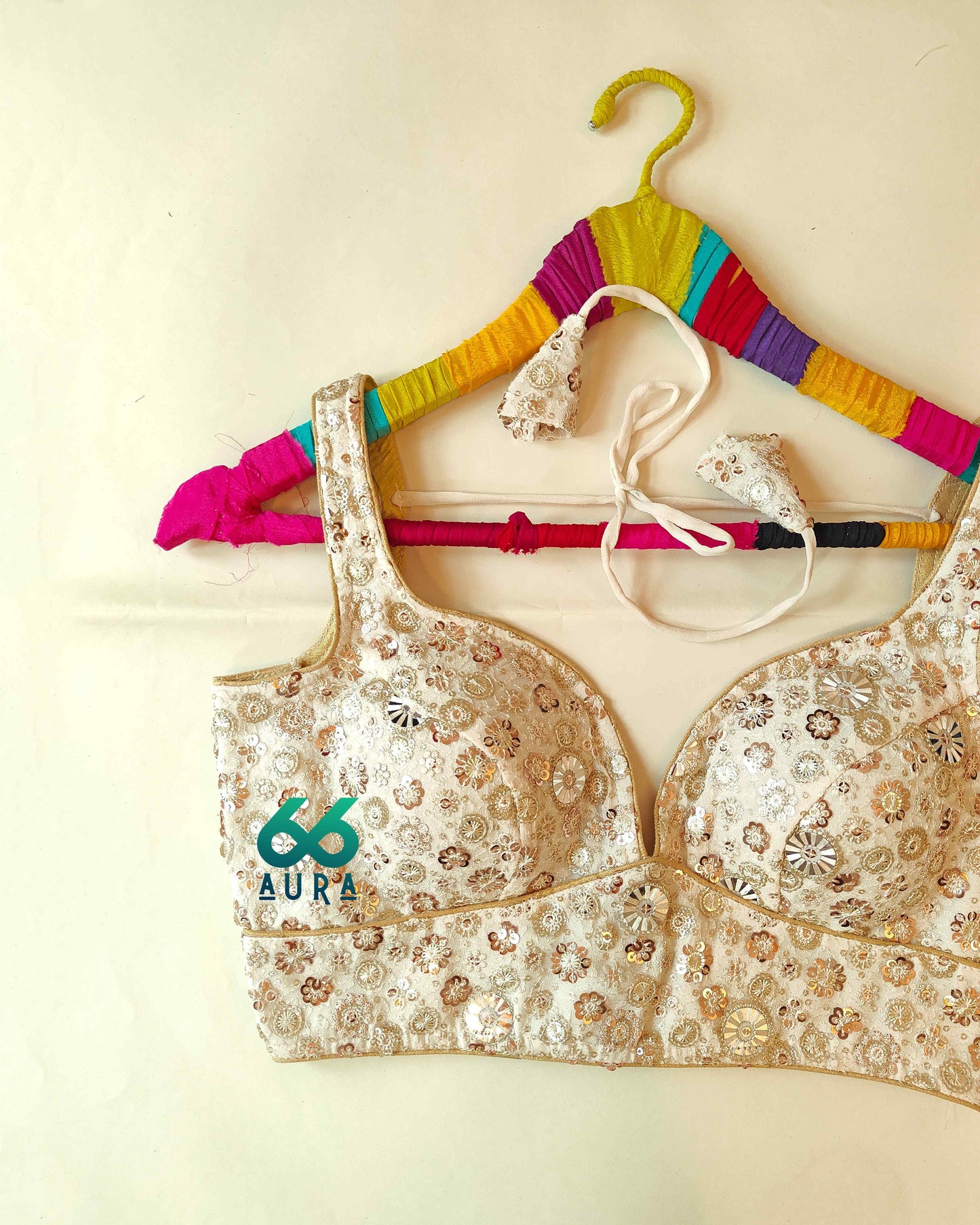 GLAM AURA SLEEVELESS BLOUSE