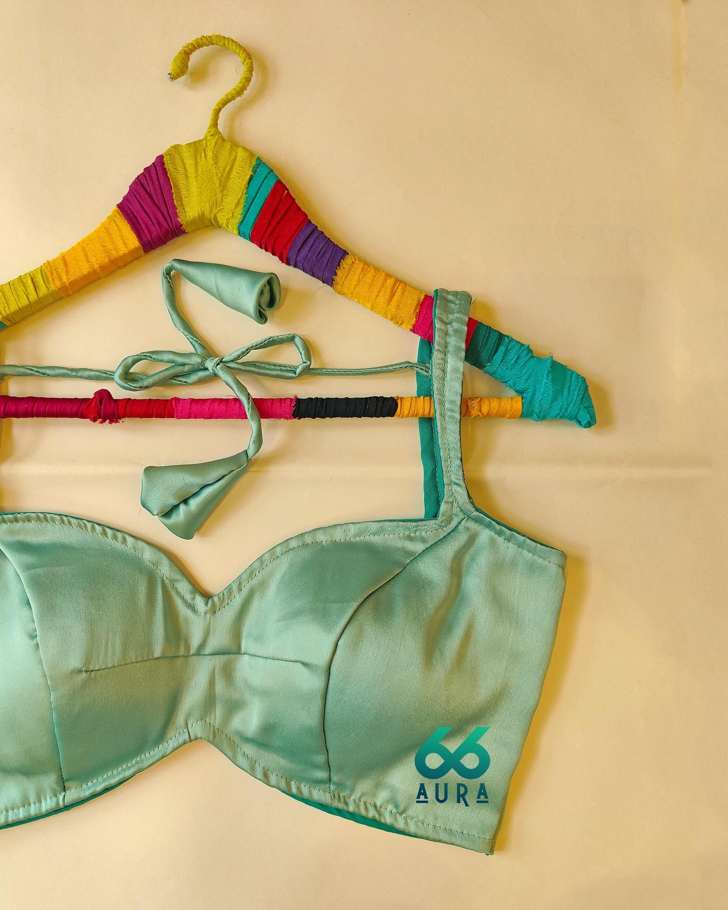 TEAL AURA SLEEVELESS BLOUSE