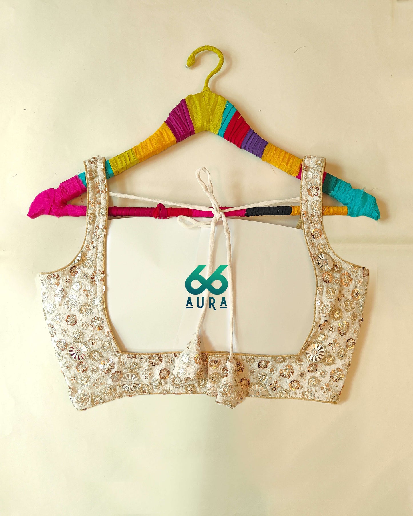 GLAM AURA SLEEVELESS BLOUSE