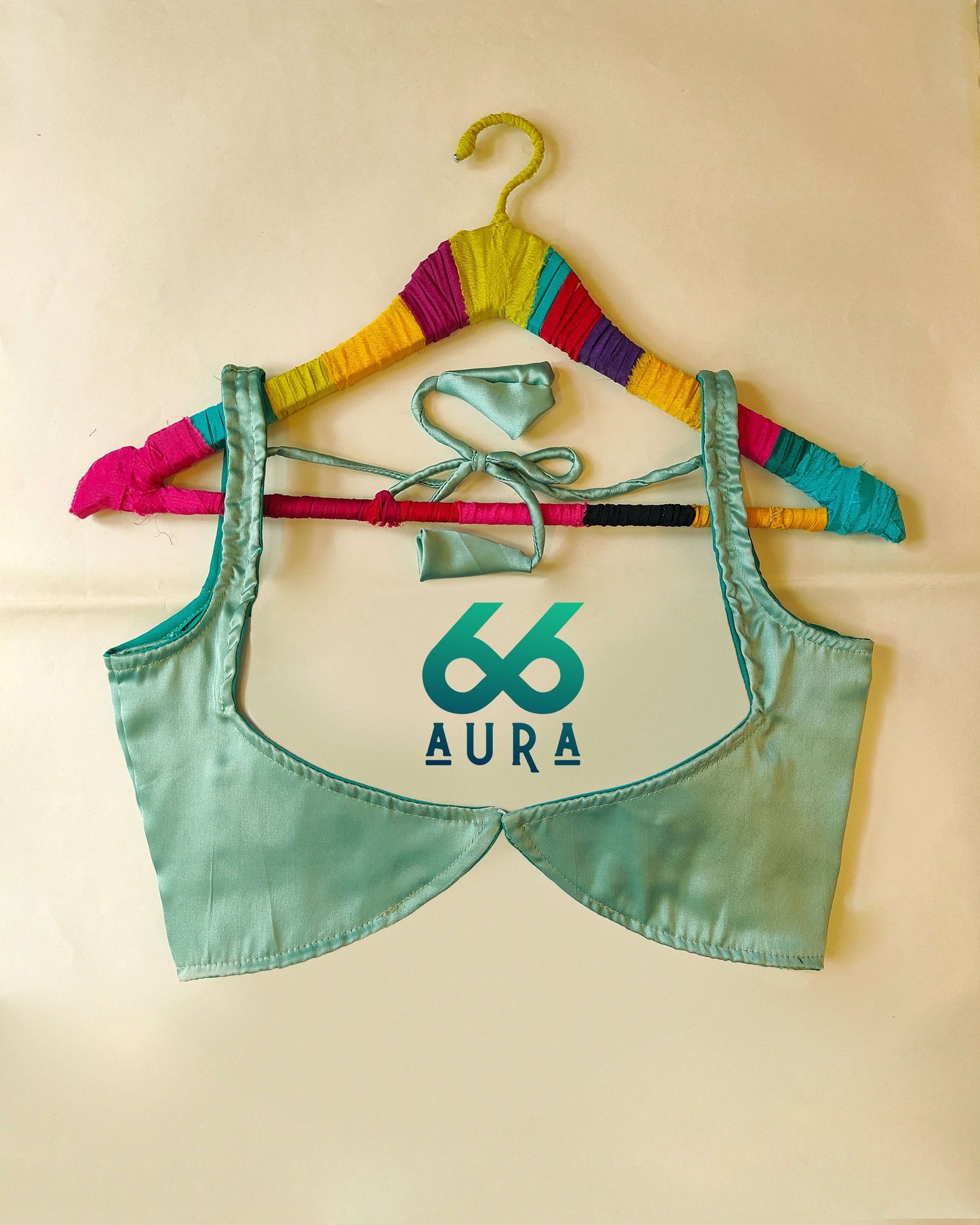 TEAL AURA SLEEVELESS BLOUSE