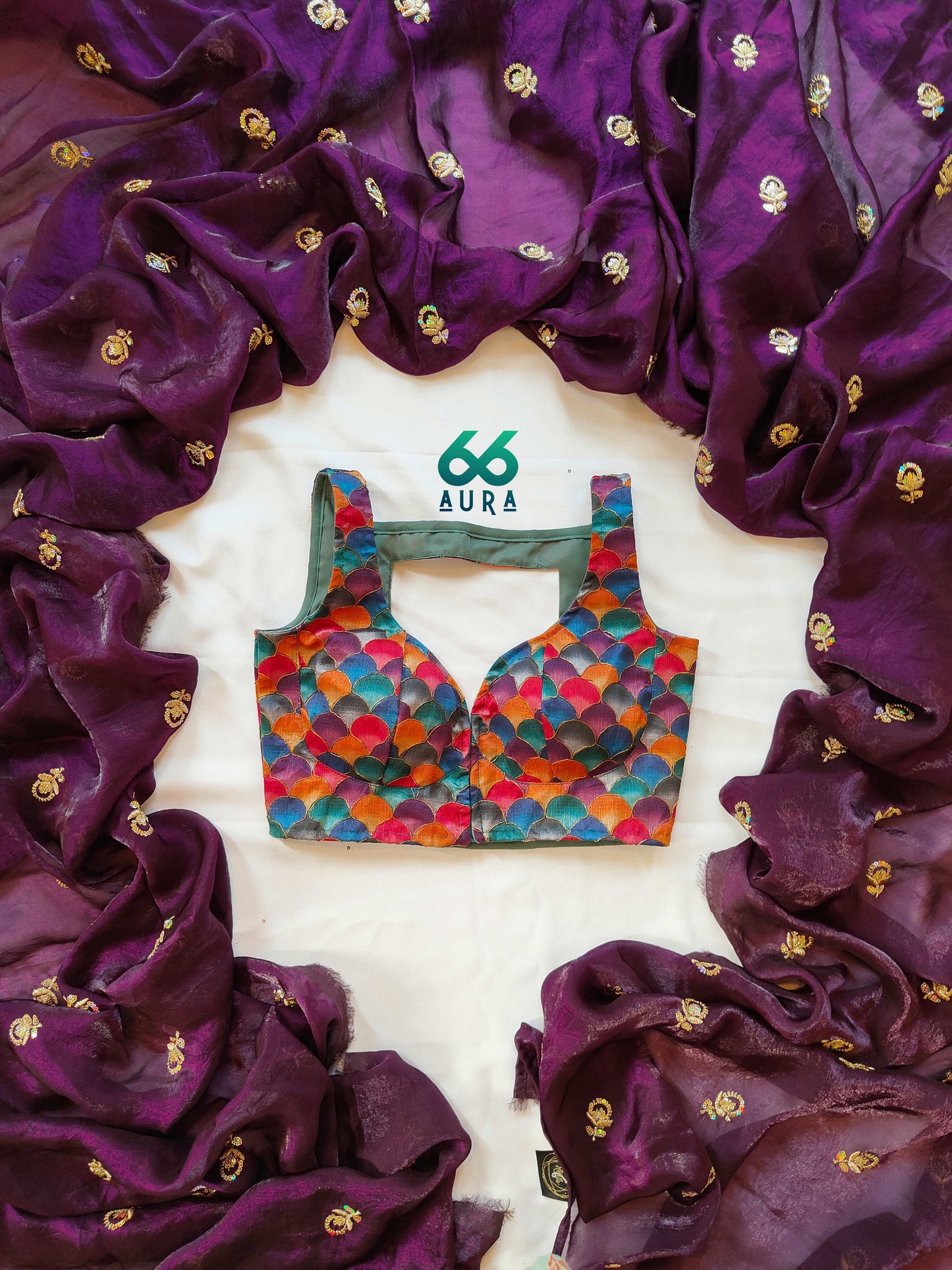 VIVID AURA SLEEVELESS BLOUSE