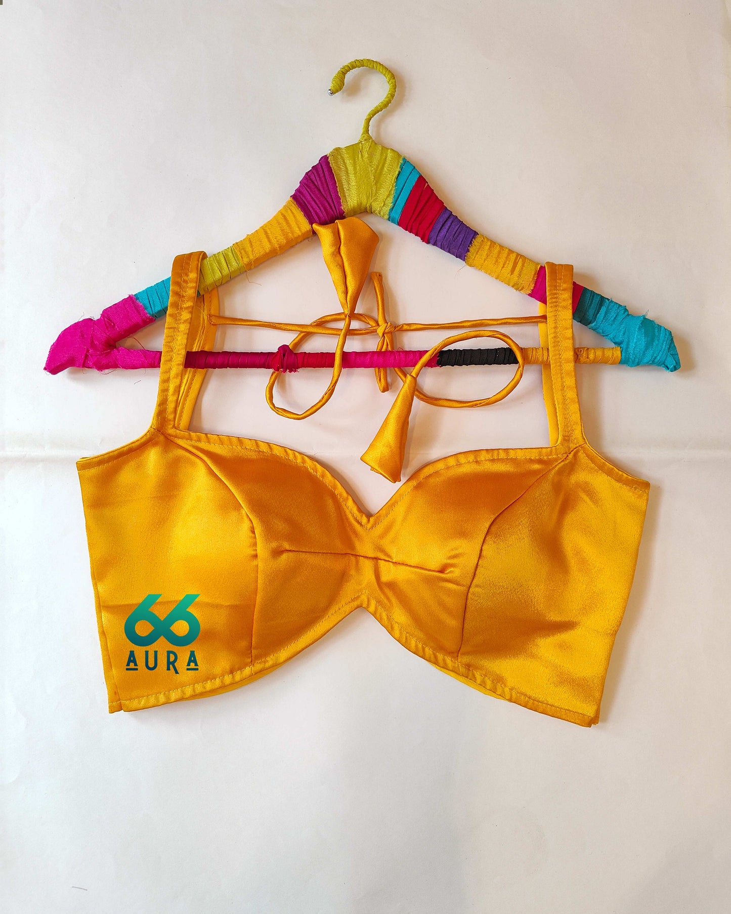 AMBER AURA SLEEVELESS BLOUSE