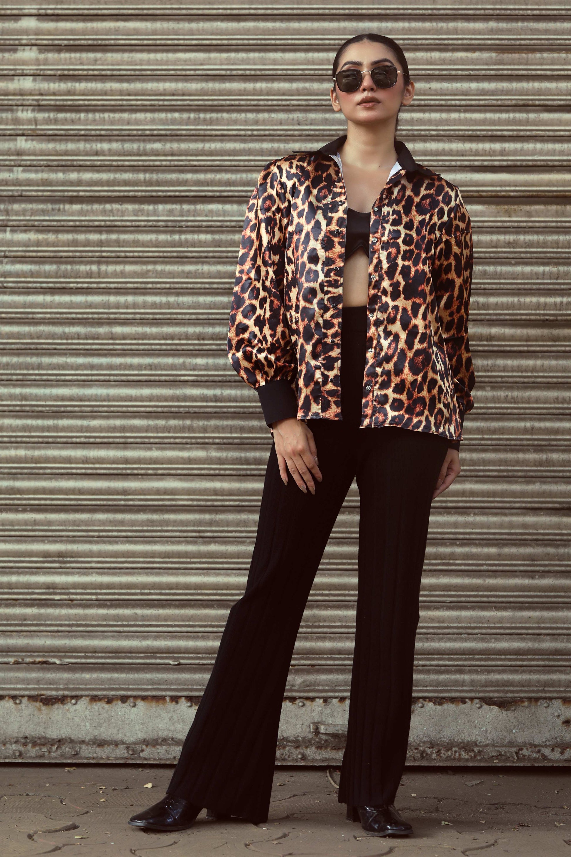 Men's BOSS MOVE shirt by 66aura, featuring a stylish design with a collar, long sleeves, and button closure, displayed on a hanger.