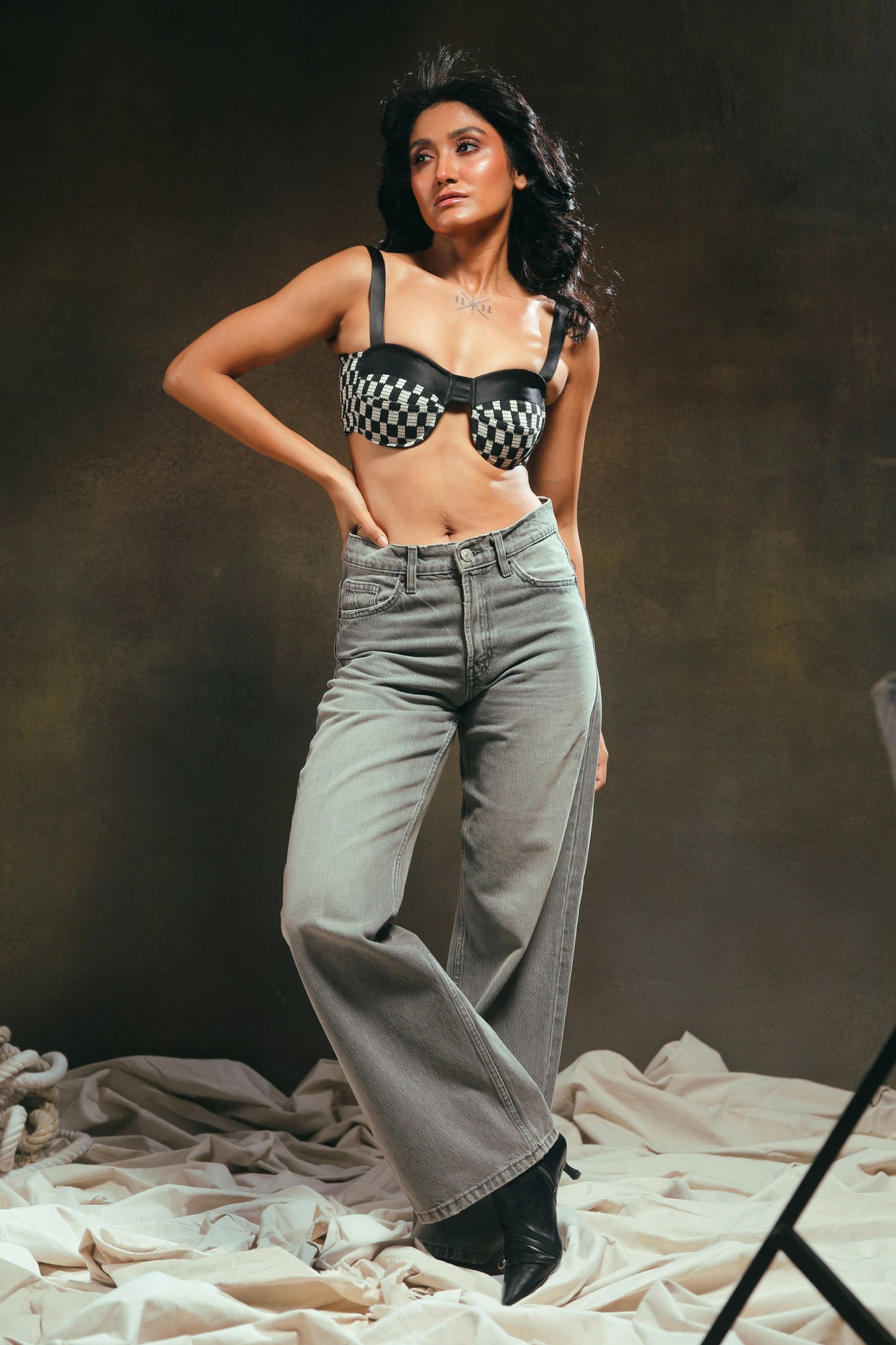 66aura Cubicle Crush Bralette featuring soft fabric, delicate straps, and floral lace details on a neutral background.