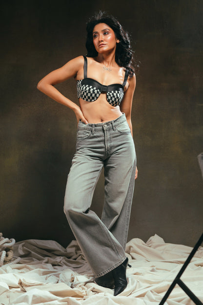 66aura Cubicle Crush Bralette featuring soft fabric, delicate straps, and floral lace details on a neutral background.