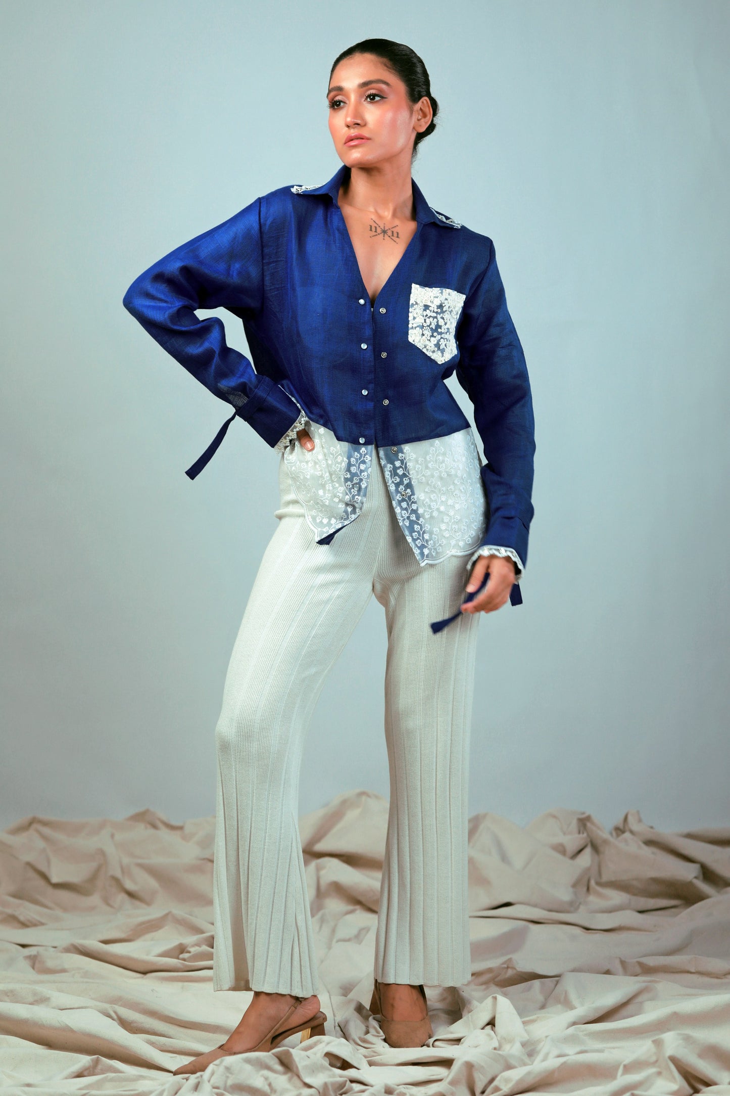 Cobalt crush oversized shirt by 66aura, featuring a loose fit and casual style, shown on a hanger against a neutral background.