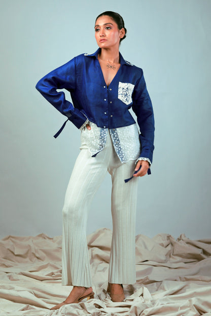 Cobalt crush oversized shirt by 66aura, featuring a loose fit and casual style, shown on a hanger against a neutral background.