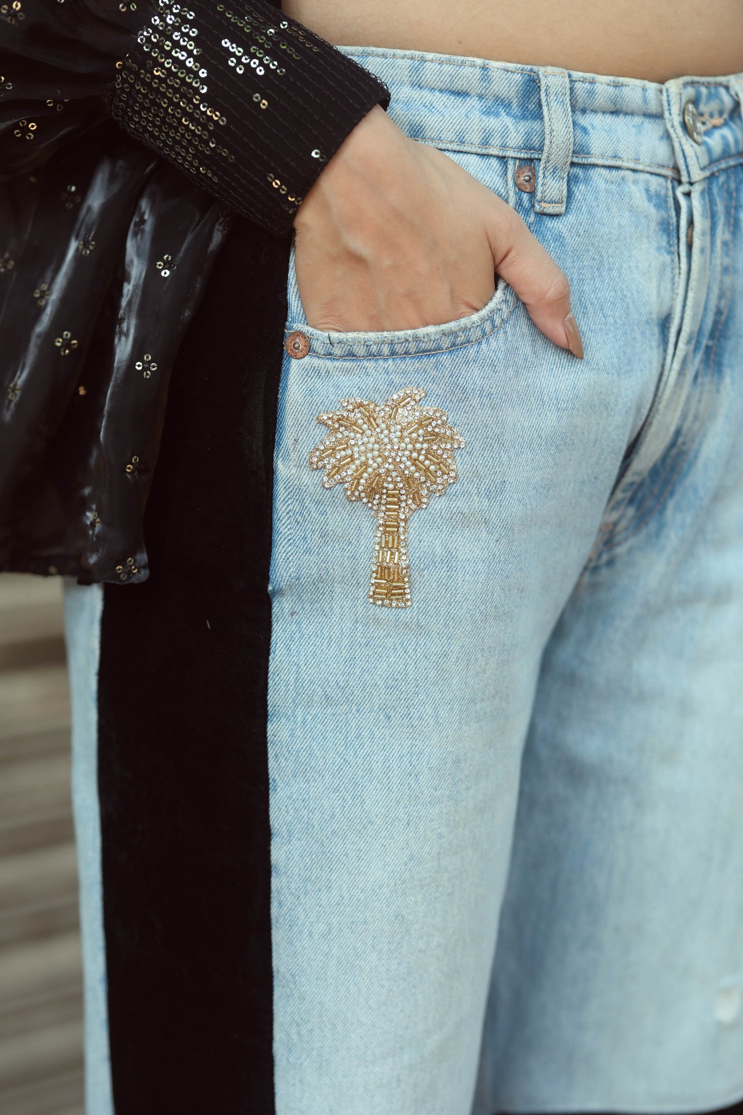 Women’s BOSS BABE jeans by 66aura featuring high-waisted fit, classic denim look, and stylish stitching details.