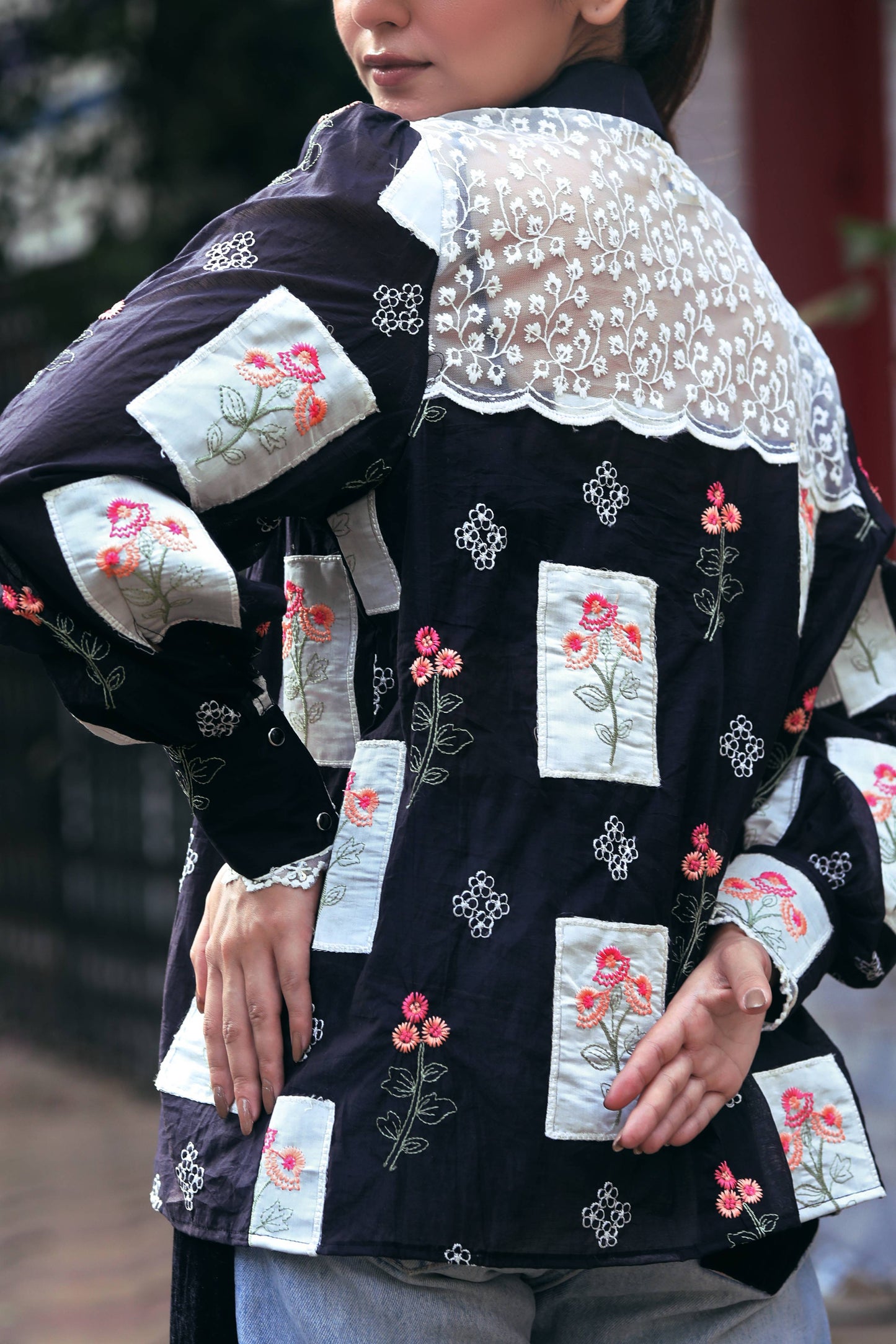 66aura VIBE CHECK shirt featuring a casual design with a colorful, patterned fabric and classic collar for stylish everyday wear.