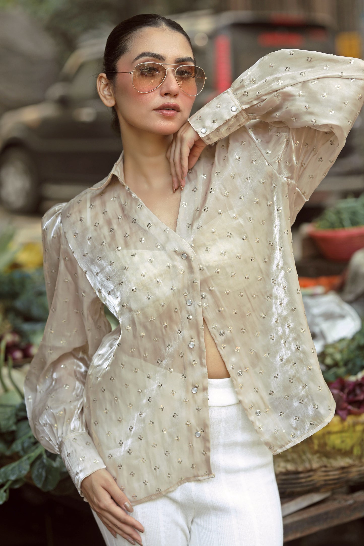 Black LOUD LUXURY shirt by 66aura with bold logo print, displayed on a hanger against a plain background.