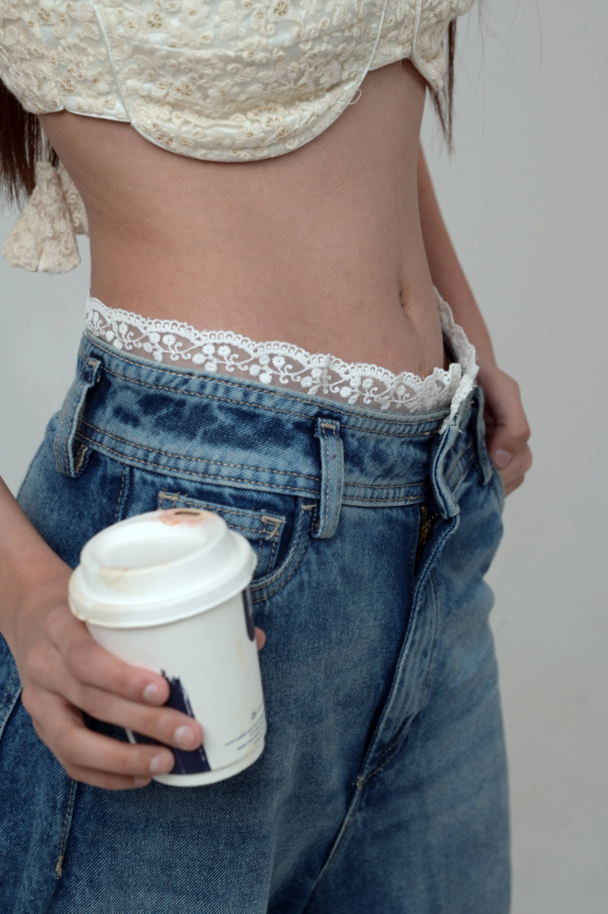 Pair of 66aura Vibe Check jeans featuring a stylish fit and classic denim design, shown on a neutral background.