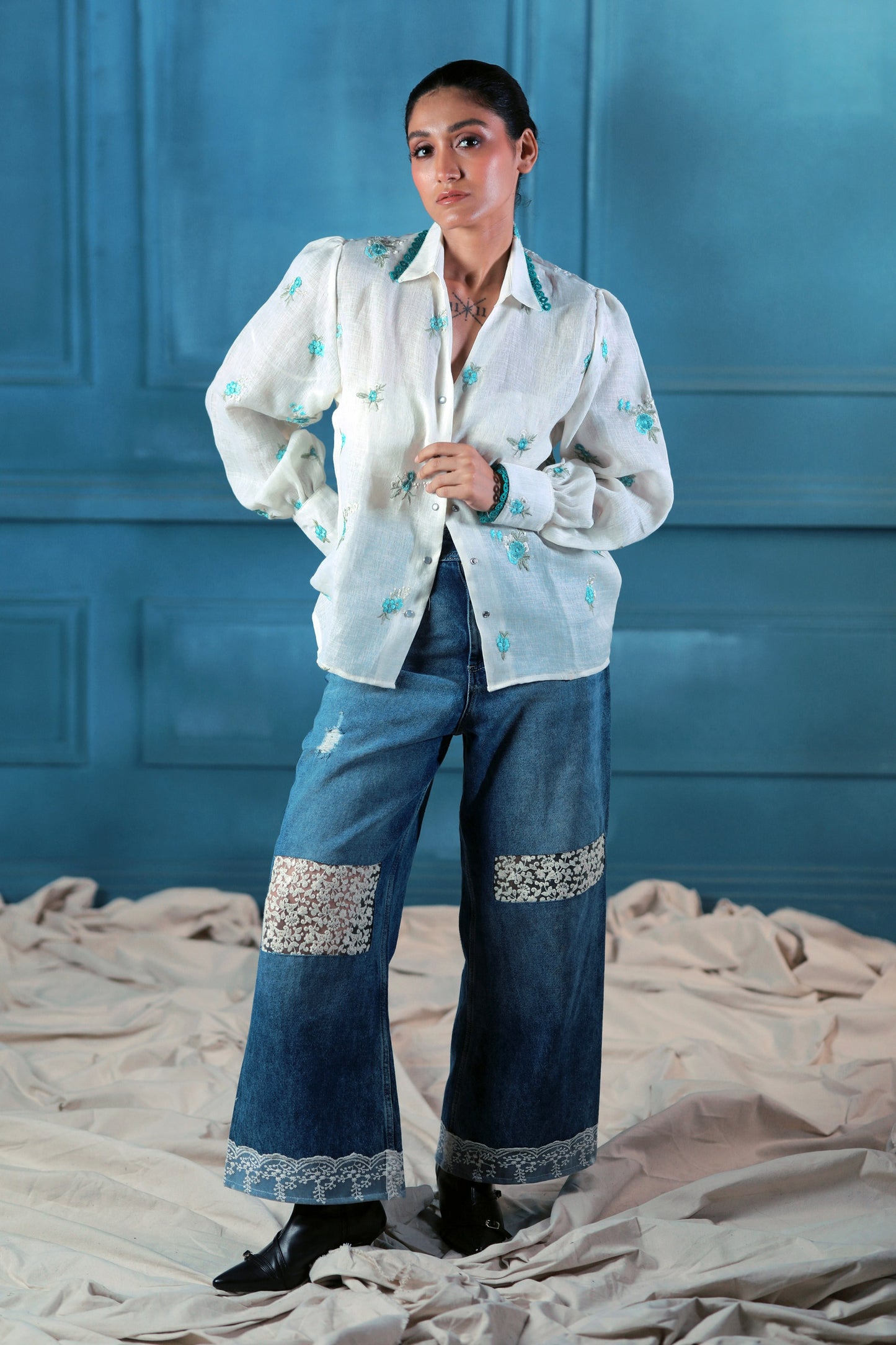 Oversized Chill Charm shirt by 66aura, featuring a relaxed fit and casual style, displayed on a hanger with neutral background.