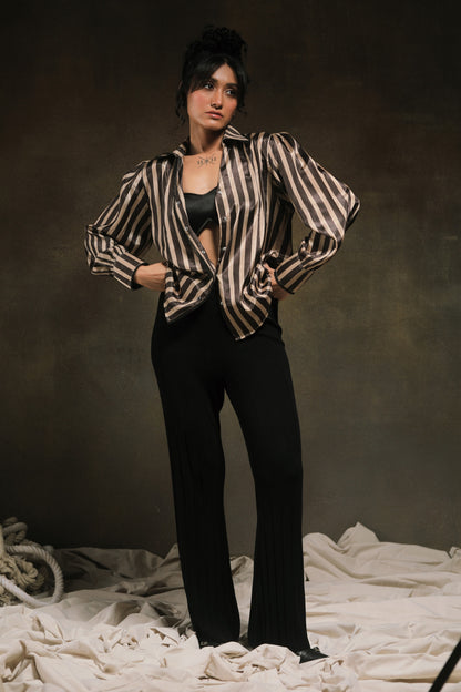 Oversized striped shirt by 66aura with blue and white horizontal stripes, featuring a relaxed fit and button-front design.