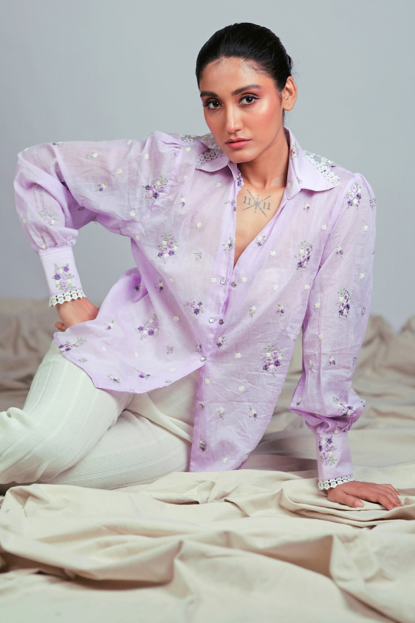 Lilac Lagoon oversized shirt by 66aura, soft fabric with relaxed fit, shown laid flat with collar and long sleeves.