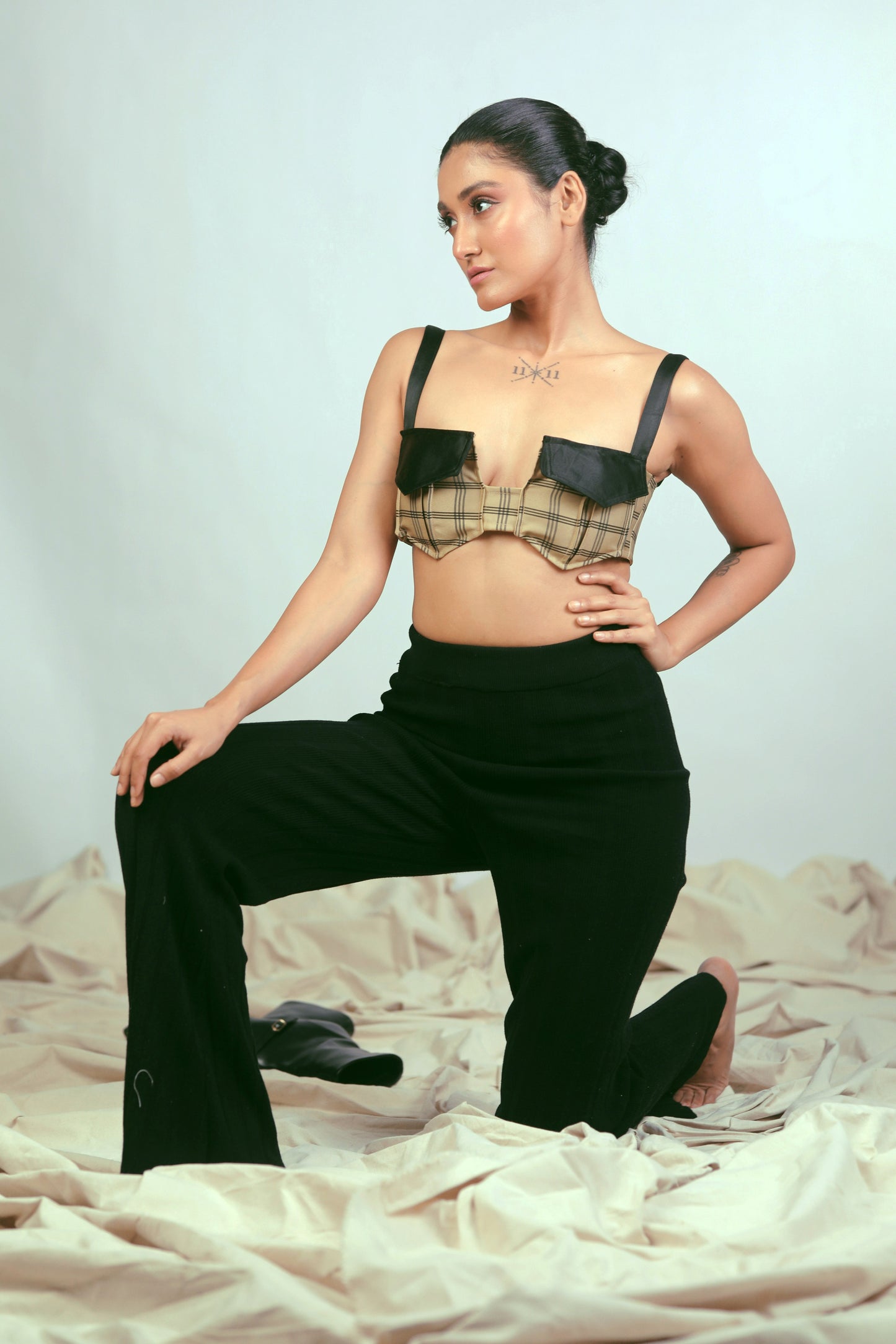 66aura Coffee Break Bralette shown in soft fabric with delicate lace details and adjustable straps.