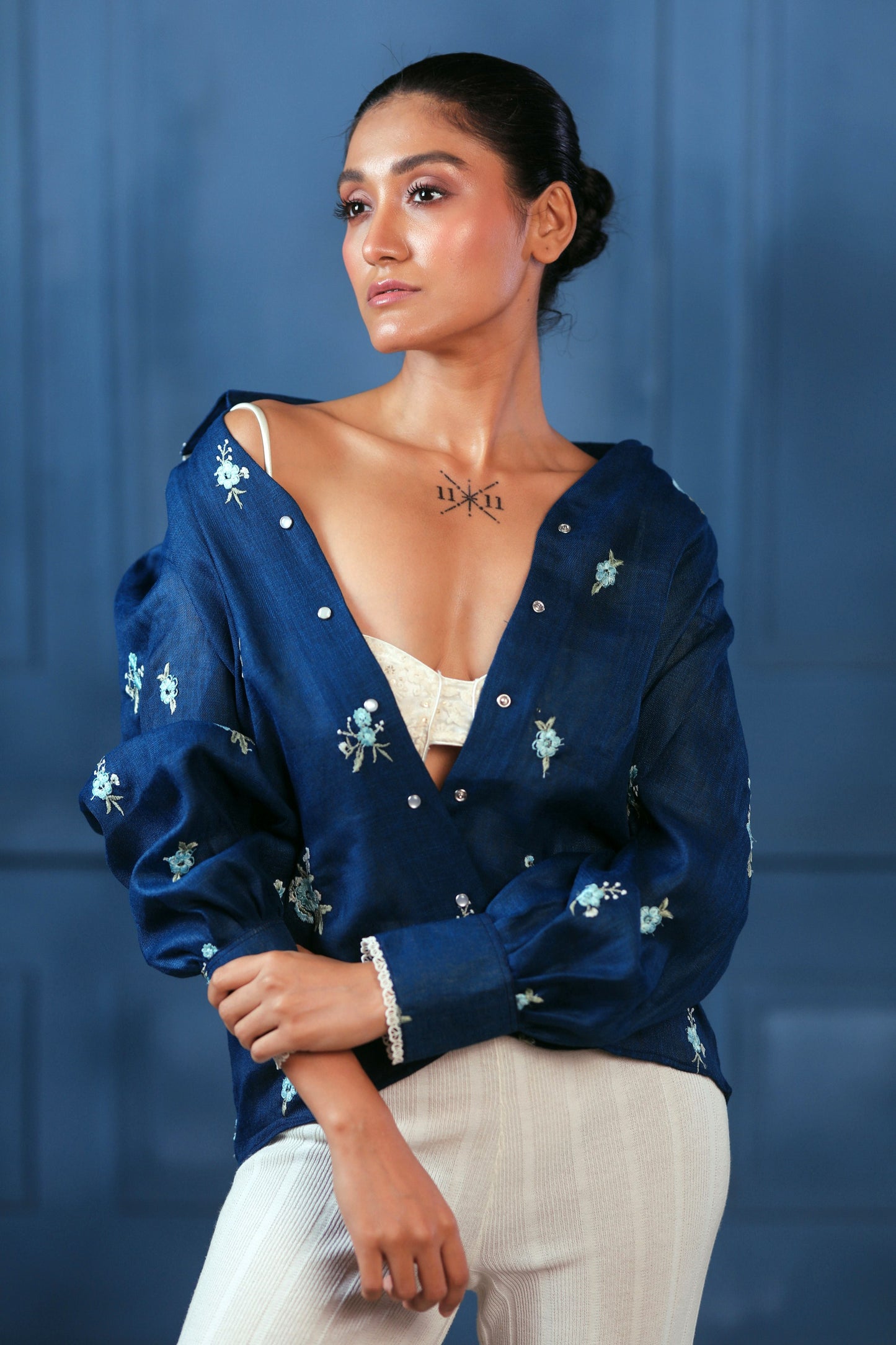 Navy Nexus oversized shirt by 66aura, featuring a relaxed fit with long sleeves and a casual, comfortable design.