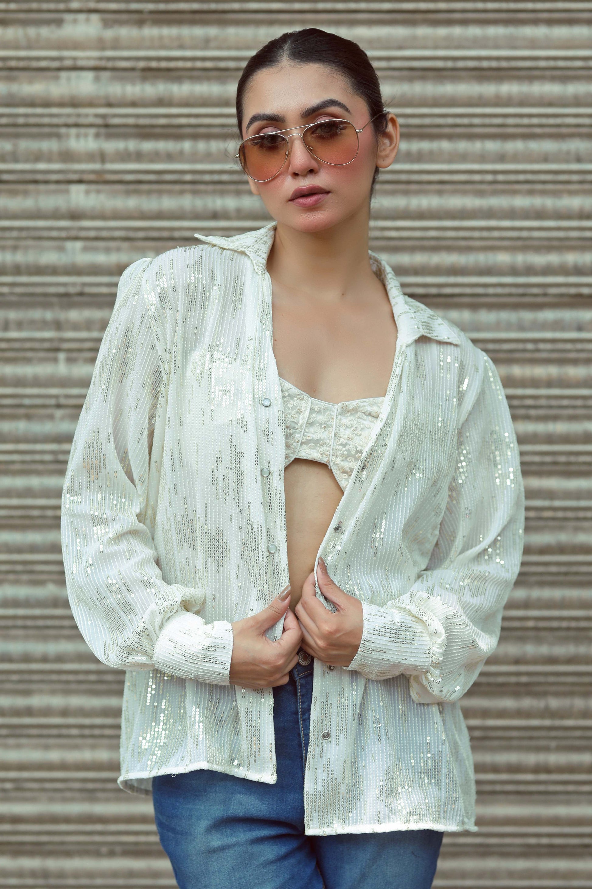 Black Drama Queen shirt by 66aura featuring bold white text and a relaxed fit, displayed on a hanger.