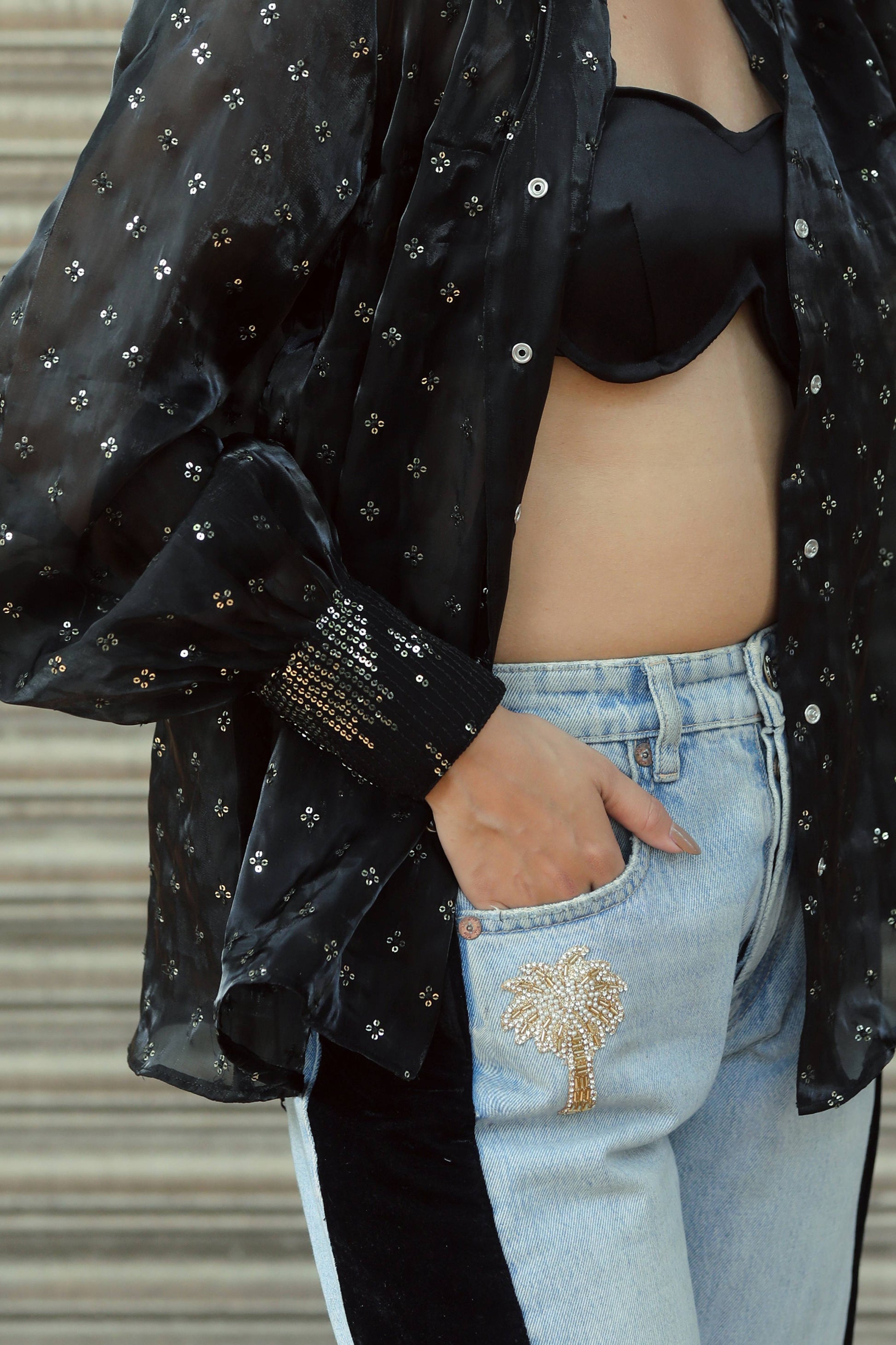 Pair of stylish BOSS BABE jeans by 66aura, featuring a classic fit with distressed details and a high-waisted design.