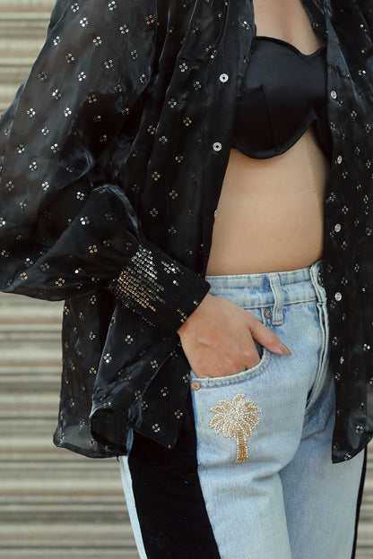 Pair of stylish BOSS BABE jeans by 66aura, featuring a classic fit with distressed details and a high-waisted design.