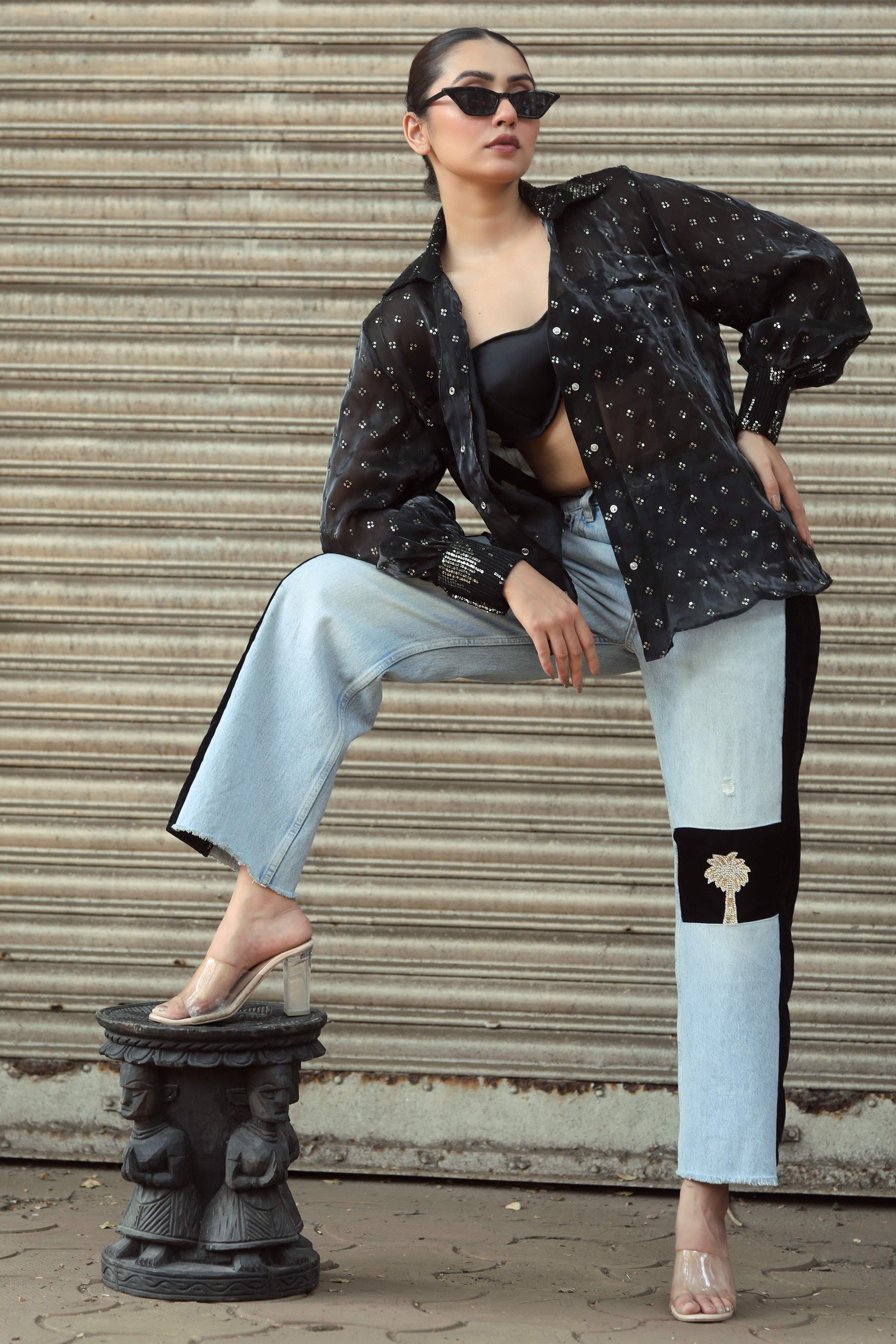 Main character shirt by 66aura featuring a stylish design, displayed on a flat surface with vibrant colors and detailed artwork.