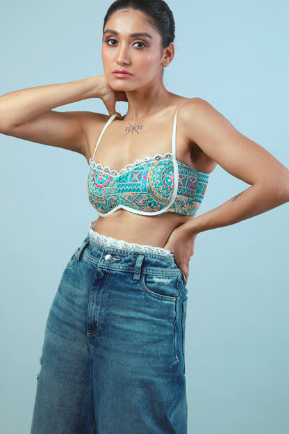 Confetti Cut Bralette by 66aura featuring a colorful, patterned design with soft fabric and adjustable straps.
