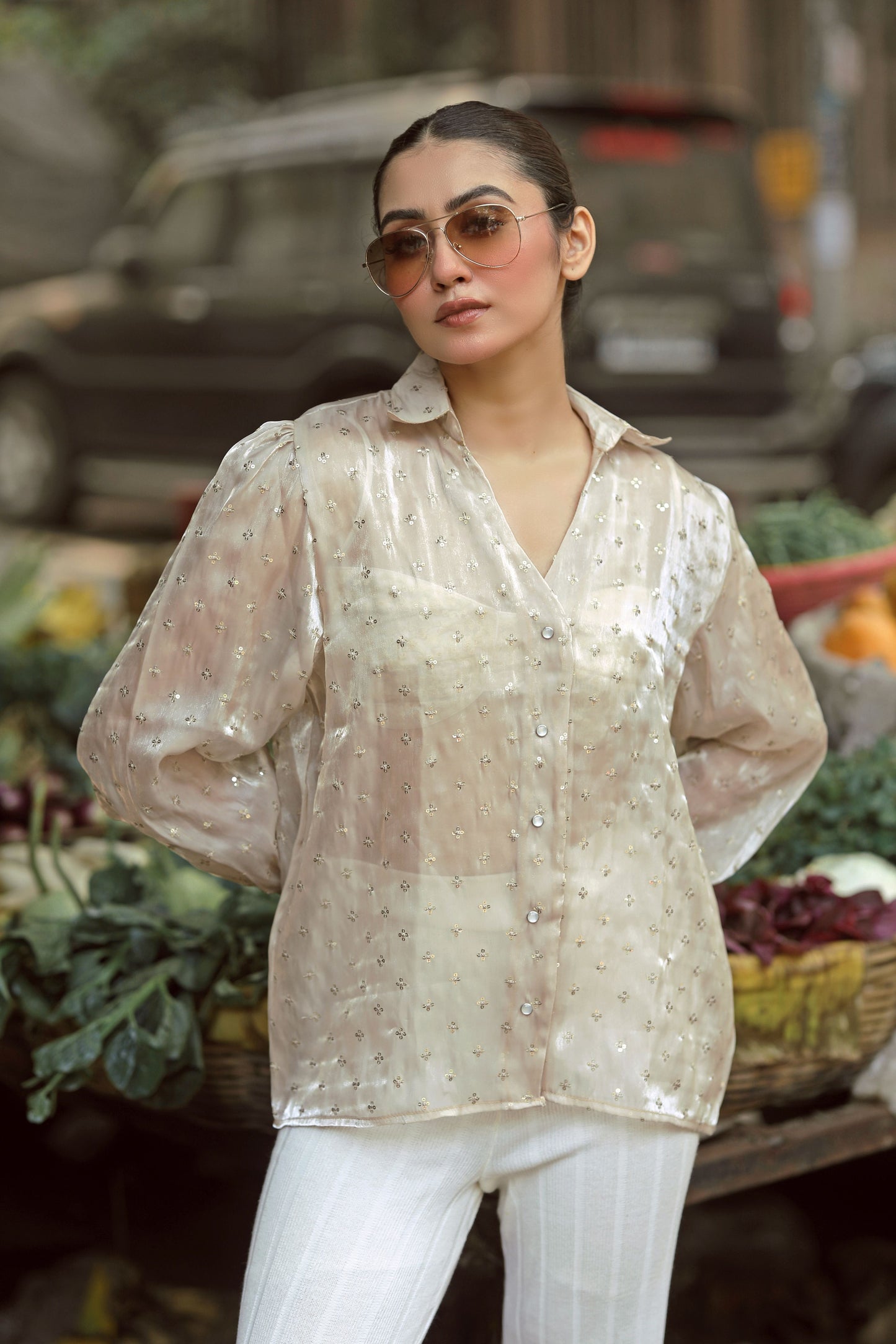 Bright yellow LOUD LUXURY shirt by 66aura displayed on a hanger with a casual fit and stylish design.