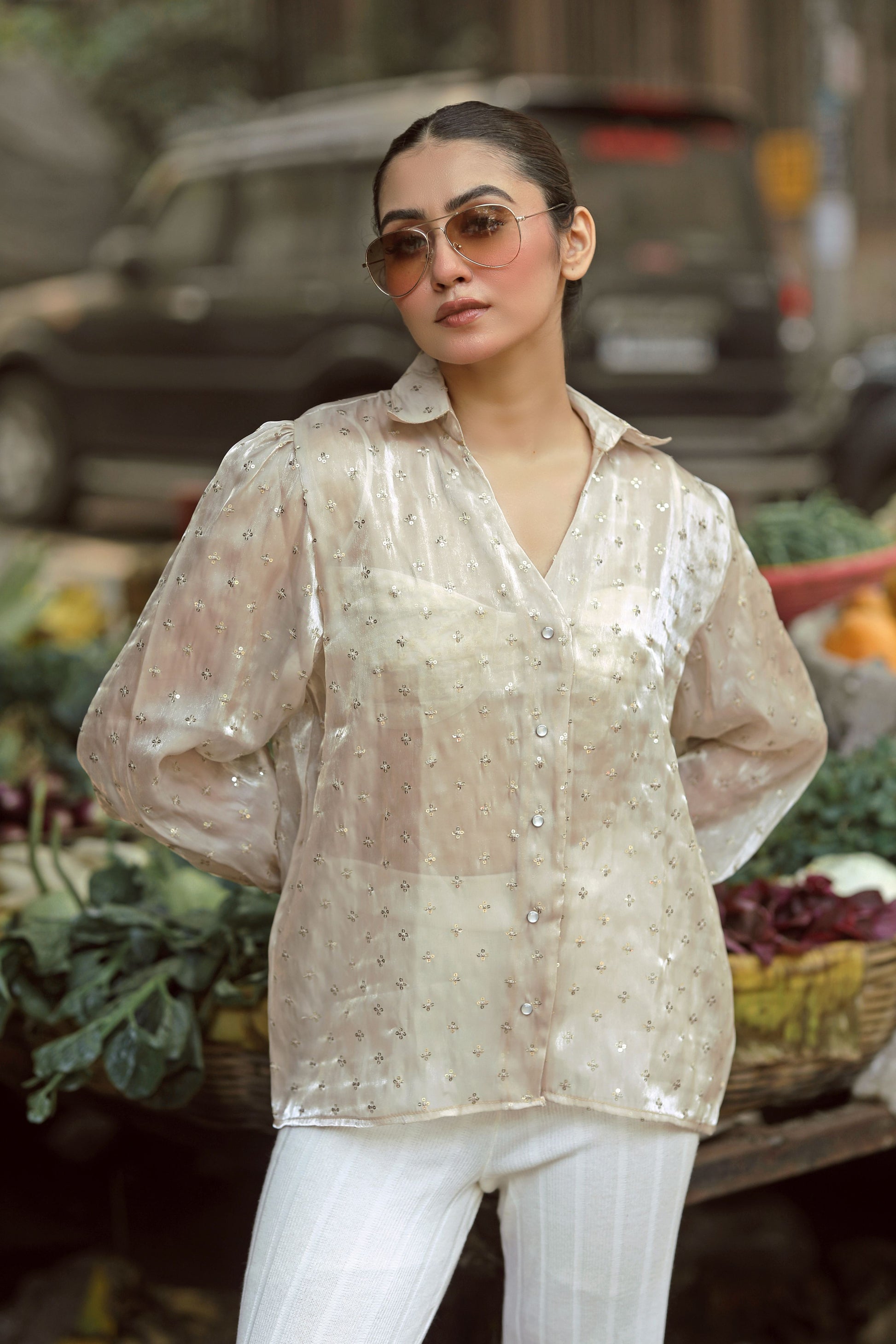 Bright yellow LOUD LUXURY shirt by 66aura displayed on a hanger with a casual fit and stylish design.