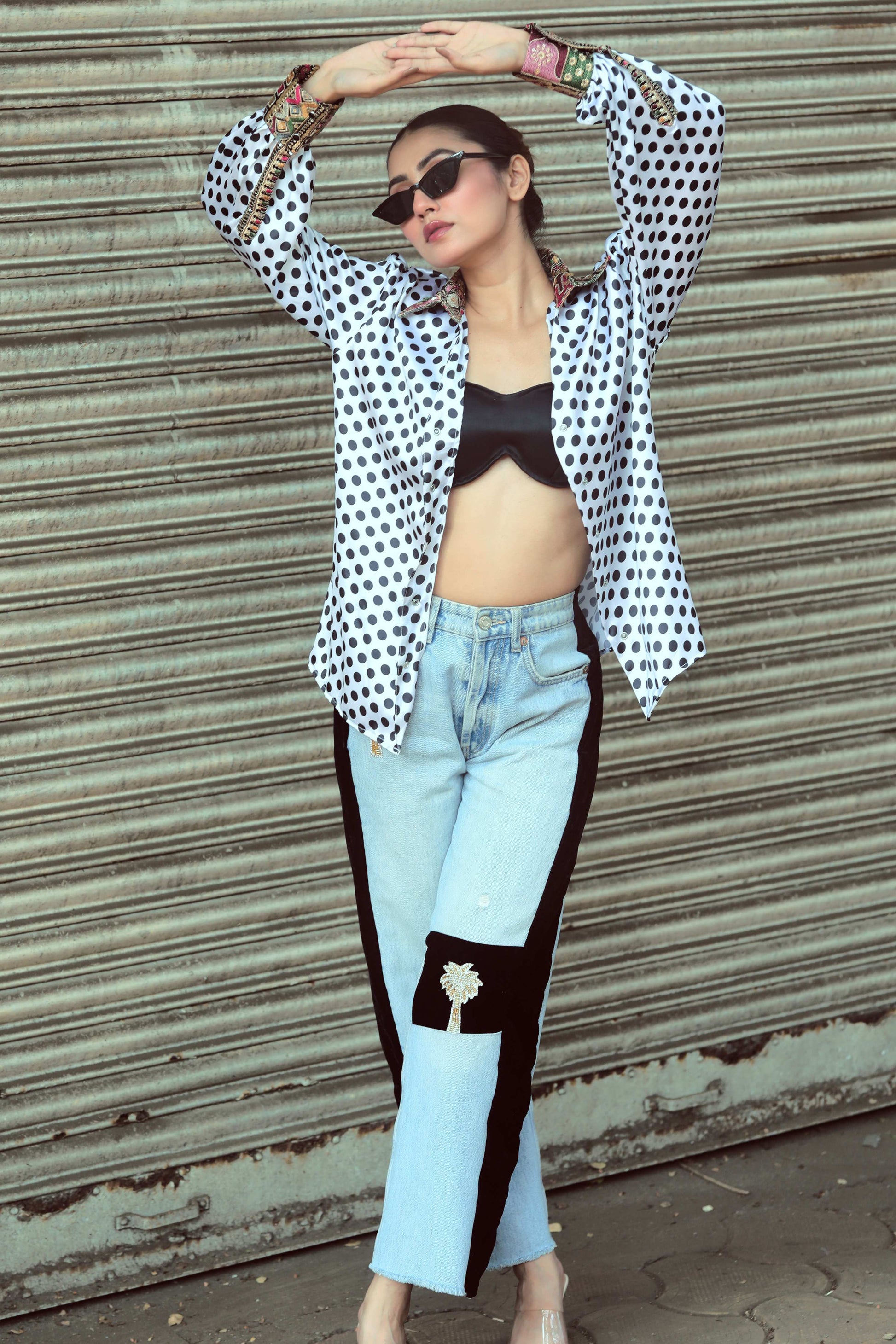 66aura Plot Twist shirt featuring a stylish graphic design on a casual men's T-shirt.