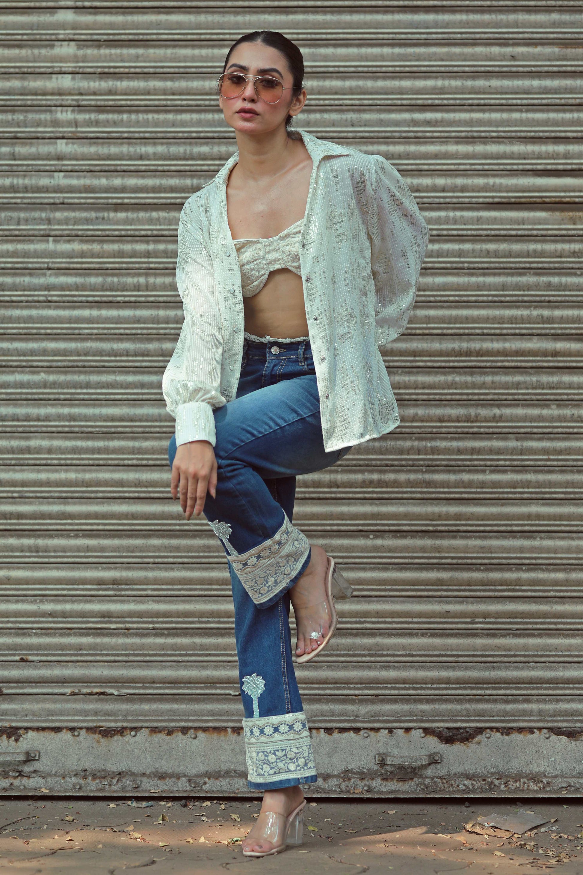 Hot Mess jeans by 66aura featuring distressed denim with a trendy, rebellious style and a slim fit design.