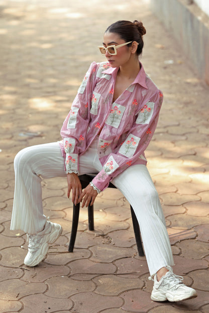 Lilac Loco Shirt by 66aura, featuring a relaxed fit, soft fabric, and stylish design, displayed on a hanger.