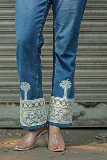 Hot Mess jeans by 66aura featuring distressed denim and a relaxed fit, shown on a model with casual styling.