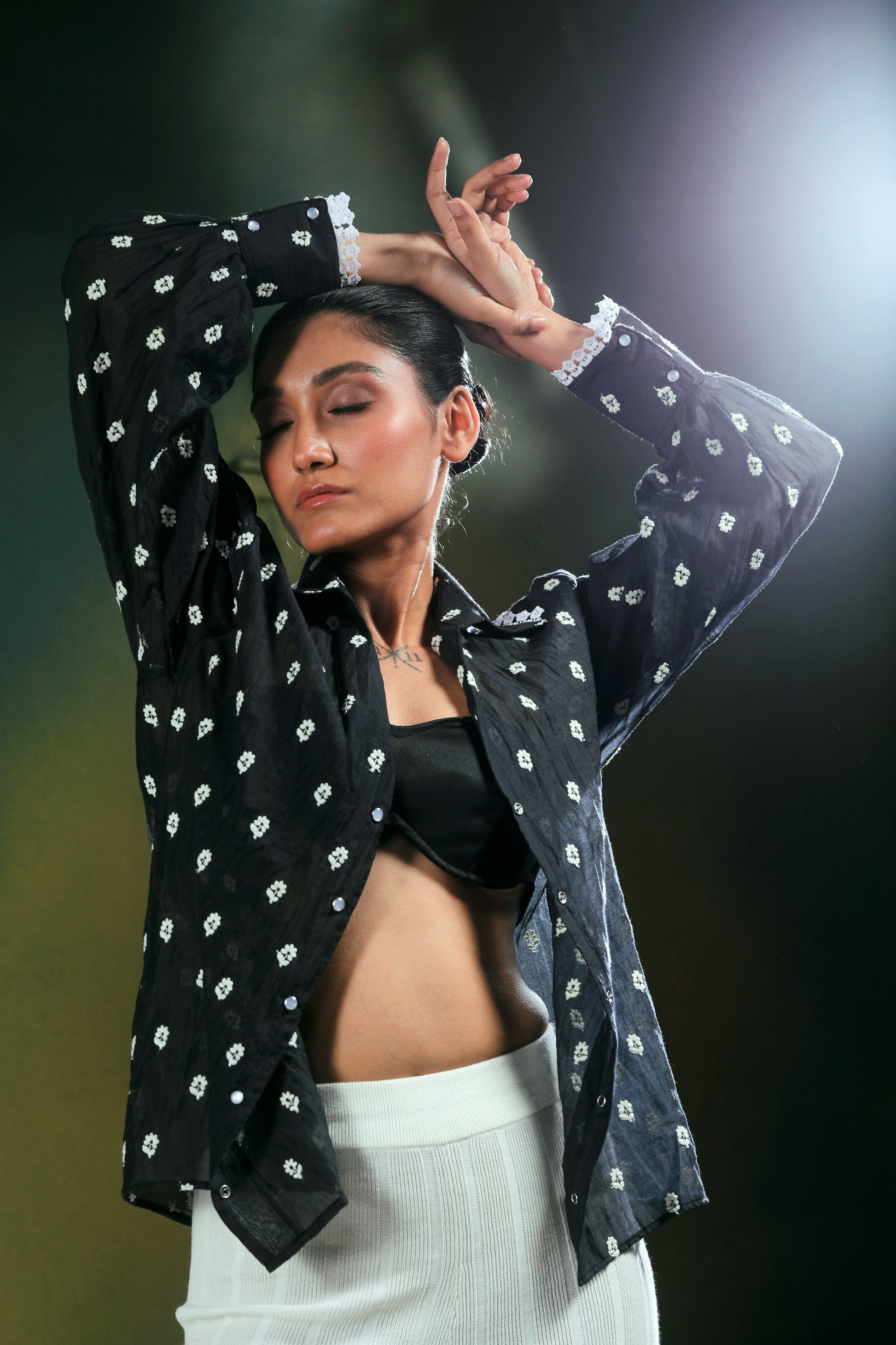 Oversized Shadow Sync shirt by 66aura featuring a relaxed fit, black and white shadow pattern, and soft fabric.