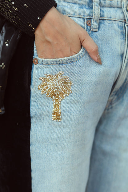 Pair of stylish BOSS BABE jeans from 66aura, featuring a classic denim design and a trendy fit, shown on a model.