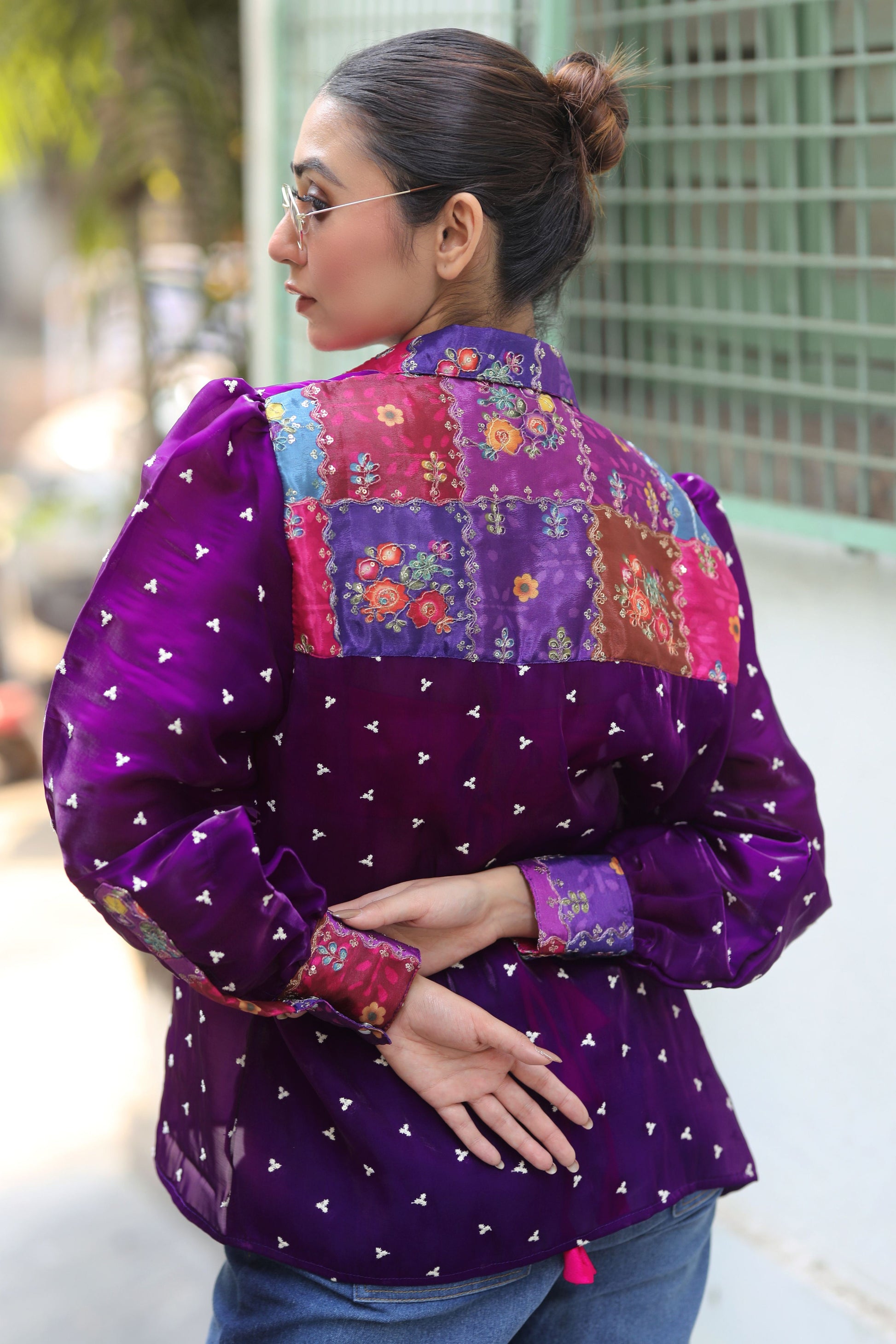 Offbeat OG shirt by 66aura displayed on a hanger, featuring a casual design with vibrant colors and comfortable fabric.