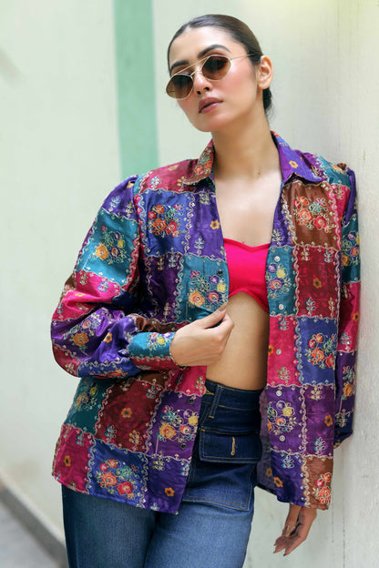 Delulu drip shirt by 66aura featuring a vibrant, colorful pattern with a relaxed fit and stylish design.