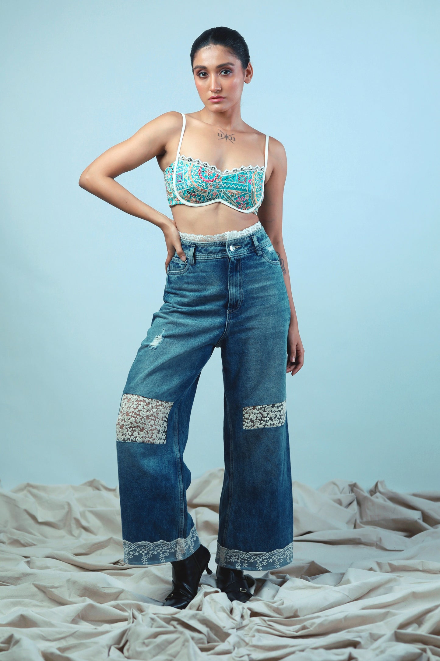 Confetti Cut Bralette by 66aura featuring colorful confetti pattern, soft fabric, and delicate straps on a white background.