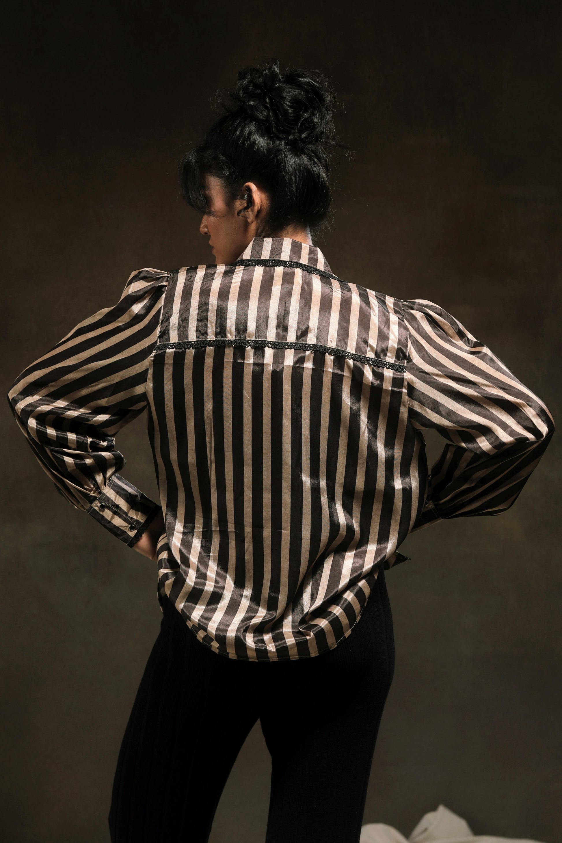 Oversized stripe spin shirt by 66aura featuring bold horizontal black and white stripes, relaxed fit, and soft fabric.