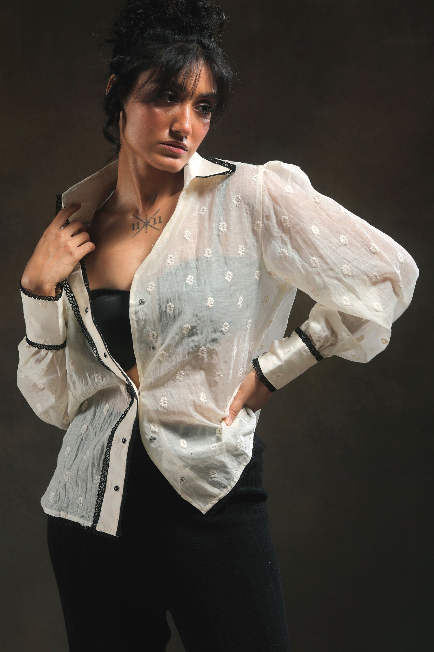 66aura Blink Blink Oversized Shirt in soft fabric, showing a loose fit with long sleeves and a casual, stylish design.