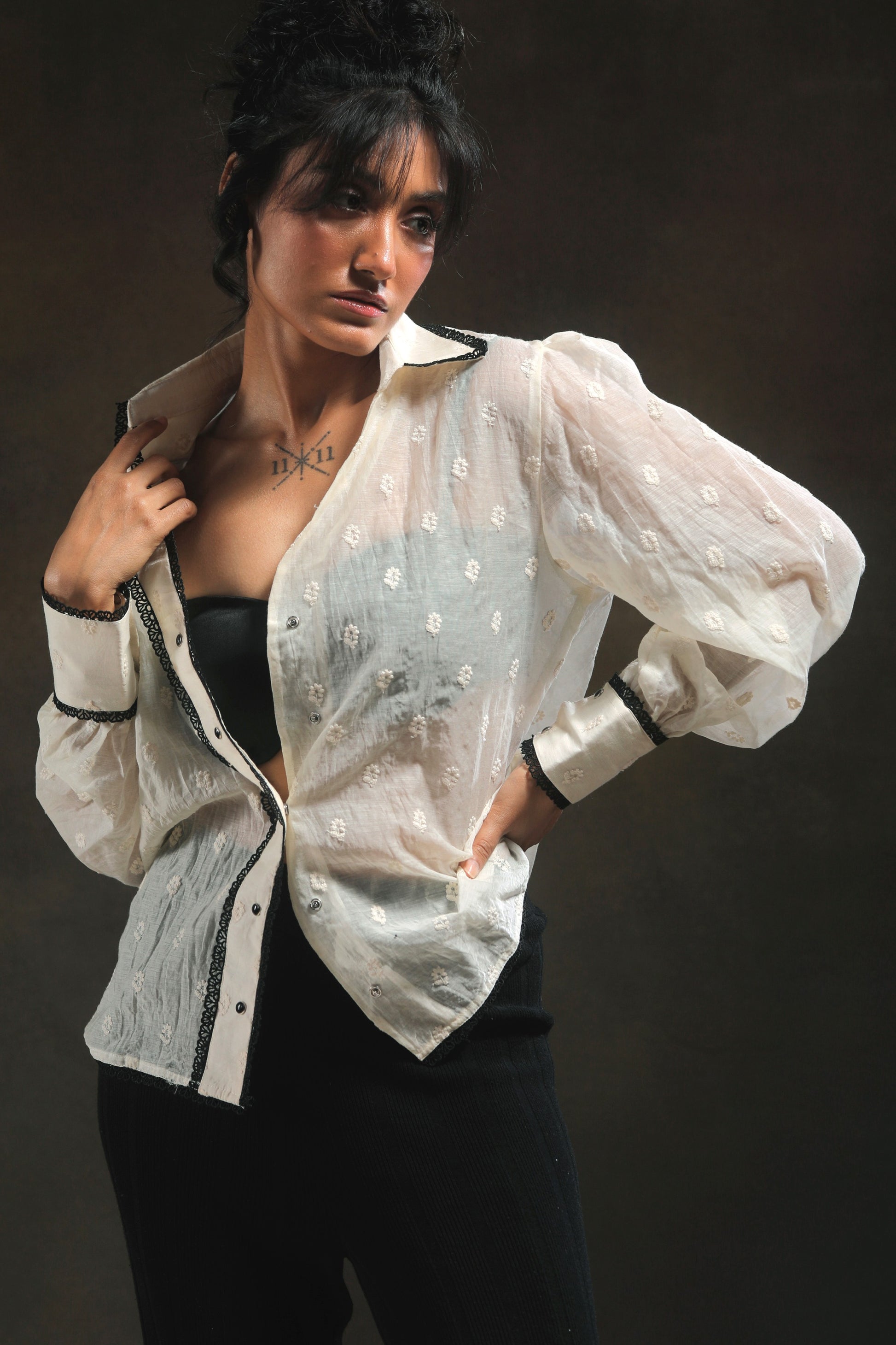 66aura Blink Blink Oversized Shirt in soft fabric, showing a loose fit with long sleeves and a casual, stylish design.