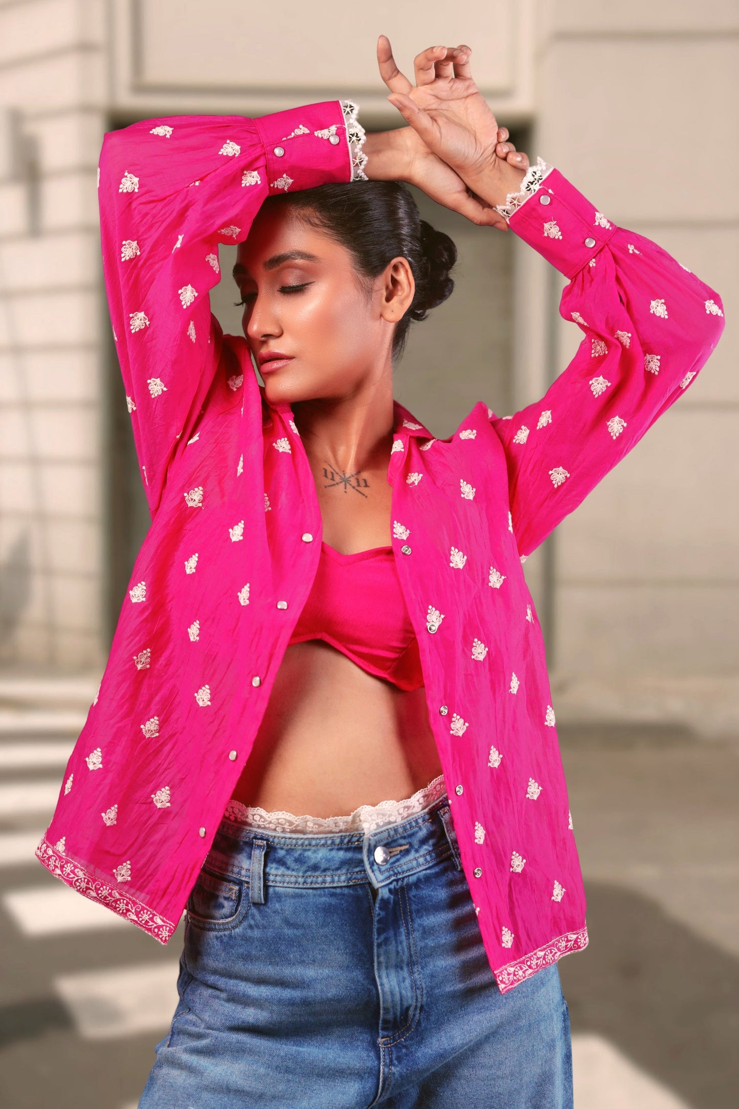 Oversized PING PING shirt by 66aura featuring a relaxed fit, soft fabric, and stylish design, displayed on a hanger.