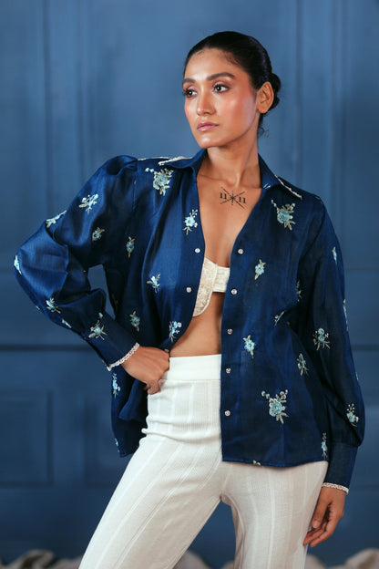 Navy Nexus oversized shirt by 66aura, featuring a relaxed fit with long sleeves and a classic collar, displayed on a hanger.