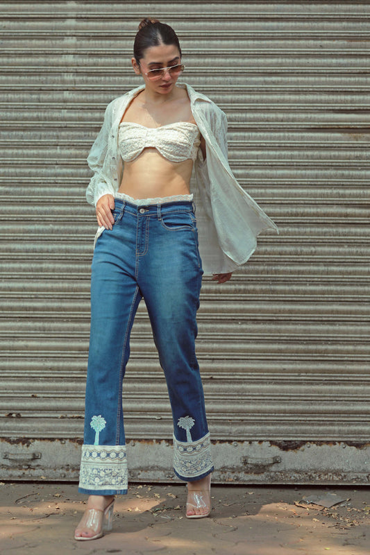 Hot Mess jeans by 66aura, showing distressed denim with a high waist and ripped details, styled for a casual look.