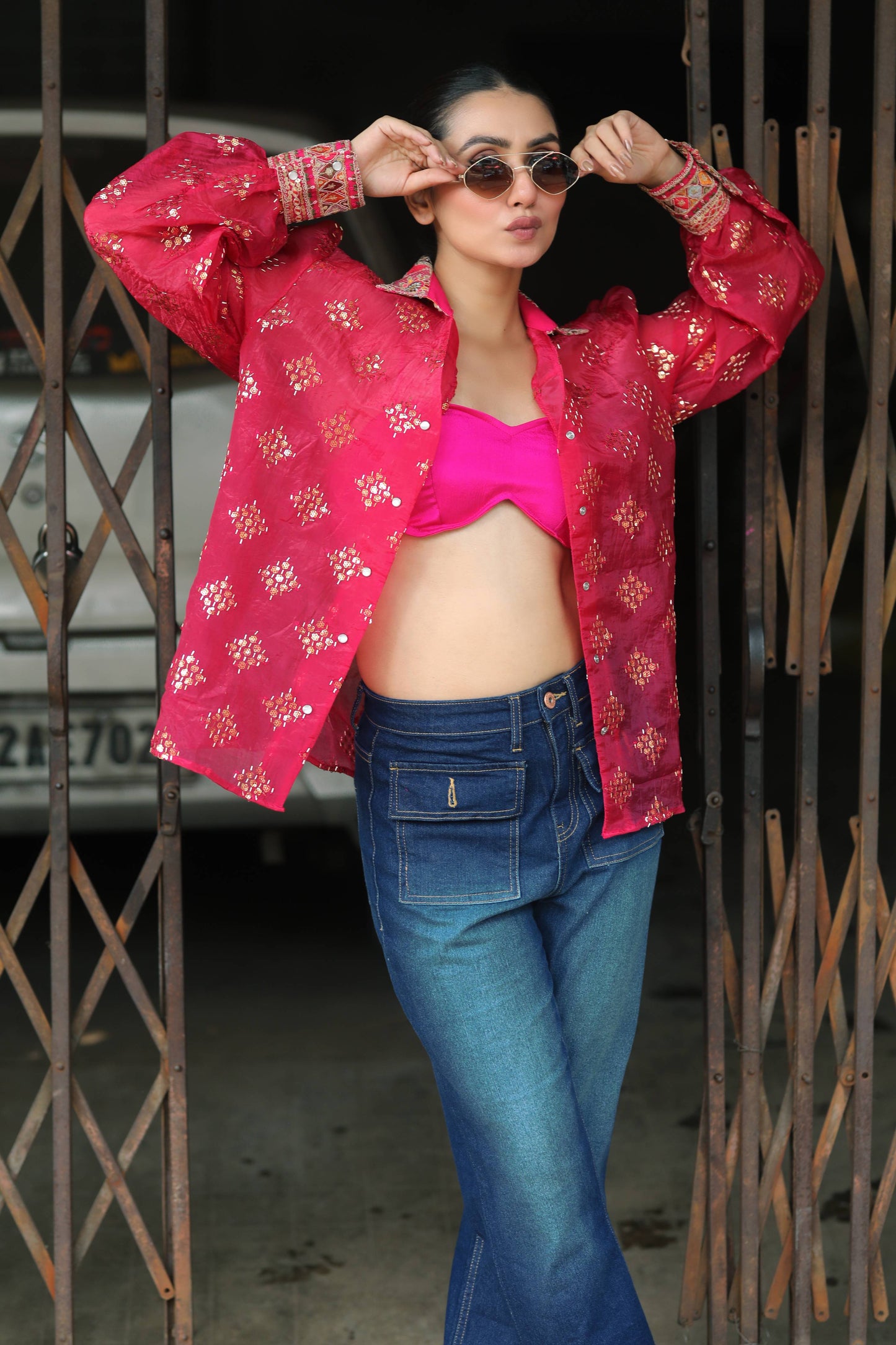 66aura drip district shirt showing a stylish casual shirt with bold drip district graphic design on the front.