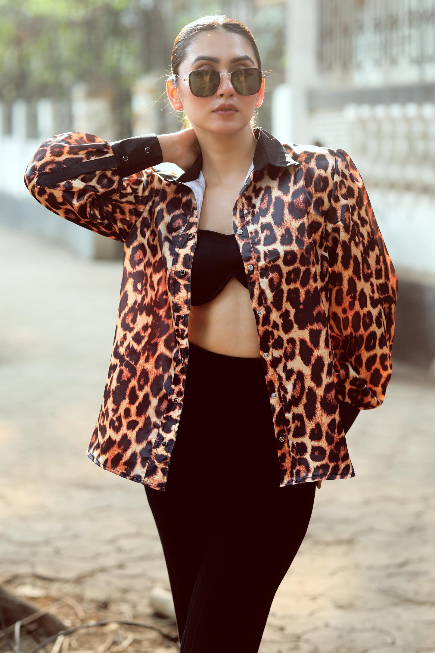 Men's BOSS MOVE shirt by 66aura, featuring a stylish design, collar, and button front, displayed on a hanger.