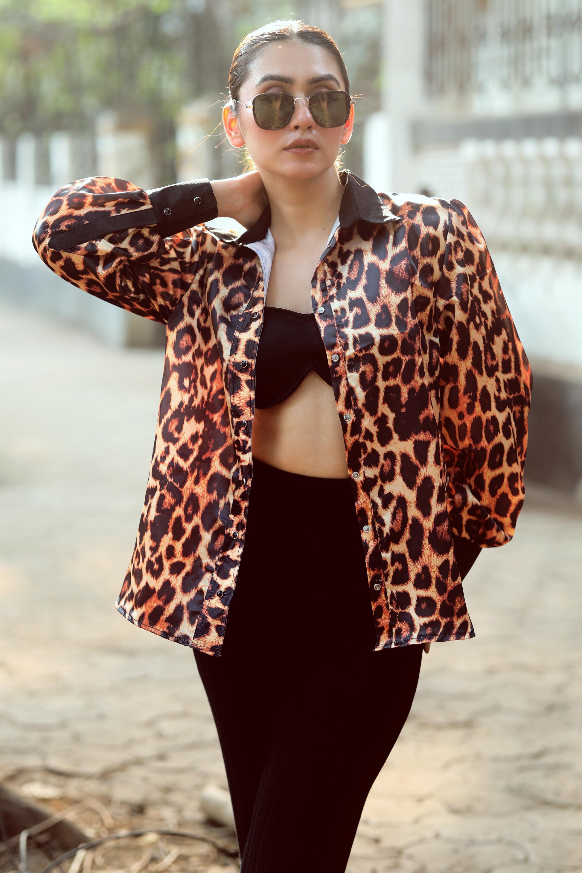 Men's BOSS MOVE shirt by 66aura, featuring a stylish design, collar, and button front, displayed on a hanger.