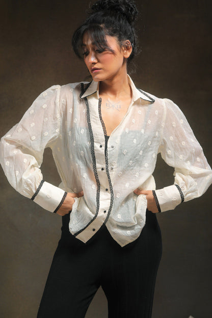 Oversized Blink Blink shirt by 66aura, featuring a relaxed fit with bold graphic design and soft fabric, worn casually.