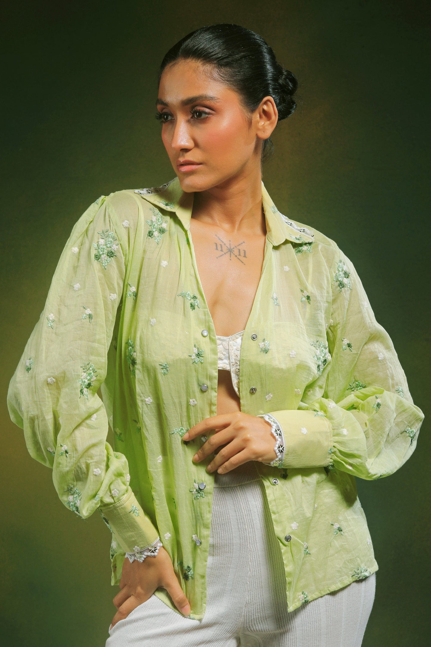 Light mint green oversized shirt by 66aura, casual fit with long sleeves and a relaxed style, displayed on a hanger.