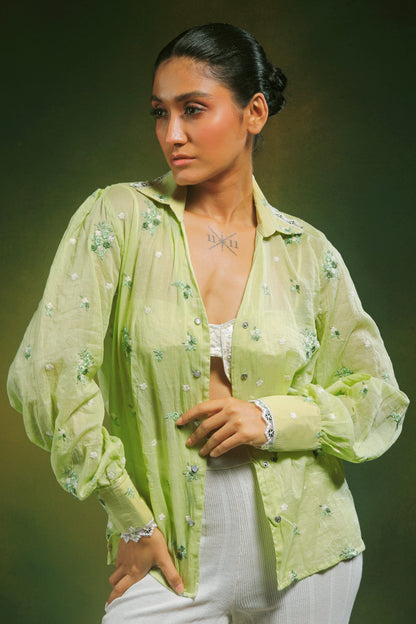 Light mint green oversized shirt by 66aura, casual fit with long sleeves and a relaxed style, displayed on a hanger.